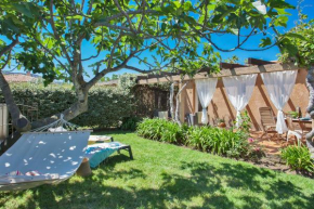 maison kiwi avec piscine chauffée terrasse jardin et bbq à Calvi
